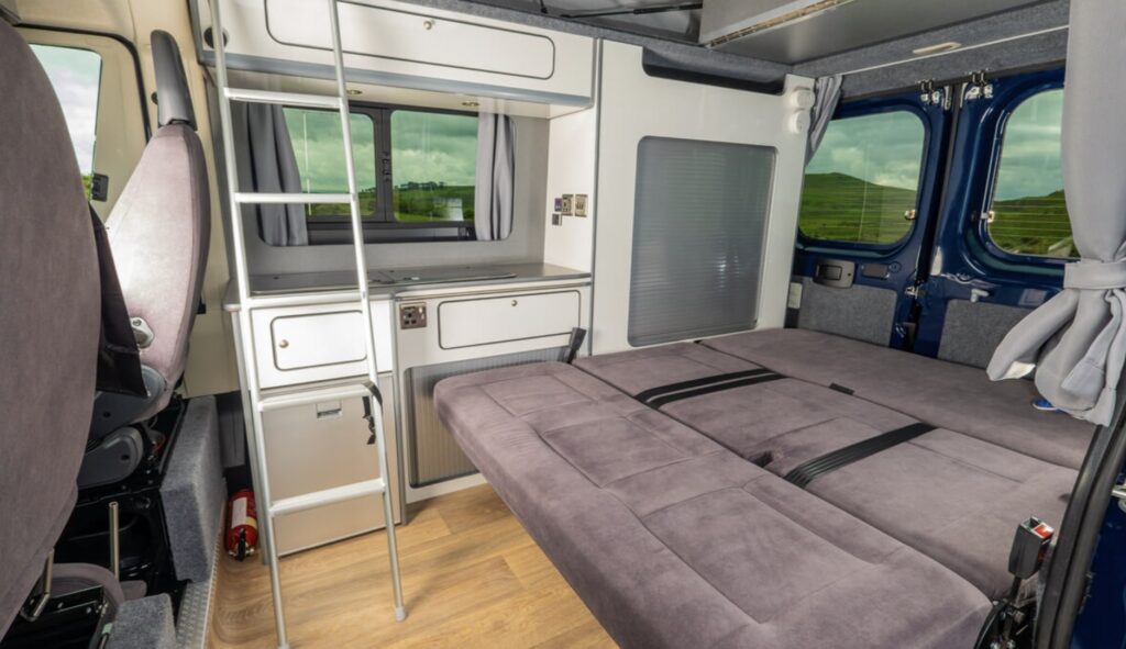 Drop down bed in the Ventura Peugeot VR200 campervan